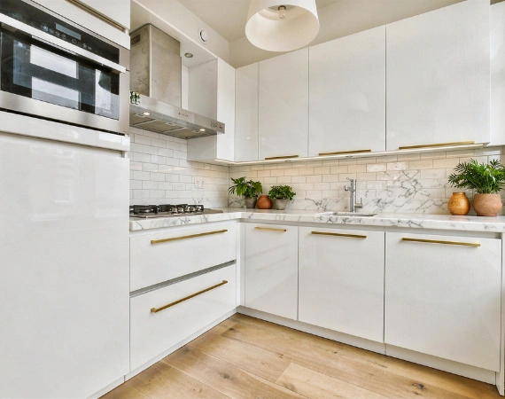 white kitchen renovation with cabinets and appliances in Los Angeles by your adu guy